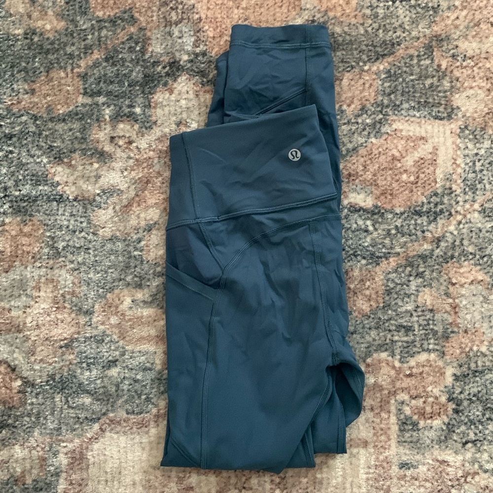 Lululemon Wunder Train High-Rise Crop with Pockets 25”.